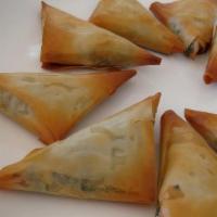 Spinach & Feta Triangles · Served with marinara sauce.