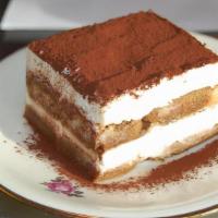 Italian Tiramisu · A delicious coffee-flavored Italian dessert. Ladyfingers dipped in coffee, layered with a wh...