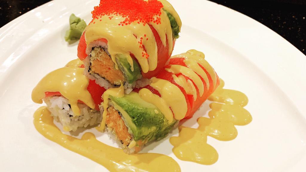 Red Dragon Roll · Spicy tuna, crunch inside w. tuna avocado tobiko w. spicy sauce on top.