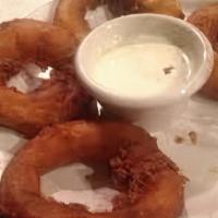 Jack'D Onion Rings · Beer battered onion rings topped with chilli and cheese
