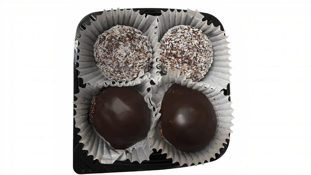 Mac/Orb Variety Pack (4-Piece) · Includes 2 delicious raw energy orbs, 1 of our exceptionally decadent chocolate-truffle dipped chocolate macaroons, and 1 chocolate-truffle dipped vanilla macaroons.  They are sure to hit the sweet spot!