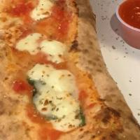 Calzone · fresh mozzarella ,ricotta ,tomato sauce , fontina , salami