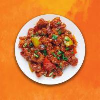 Chili Chicken Ching'S · A dish of Indo-Chinese origin, soft chicken cooked with garlic, bell peppers, and onions in ...