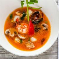 Seafood Lemongrass Soup · With Thai herb and mushrooms in a hot and sour lemongrass soup.