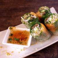Summer Garden Roll · Lightly fried tofu, cucumber, carrot, mint, basil, cilantro and sprouts with hoisin-peanut d...