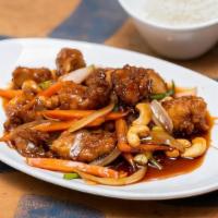 Chicken Cashew Nuts · Fried chicken tender, cashew nuts, carrot, onions and scallions in a tomato-soy sauce.