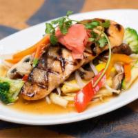 Grilled Salmon · With Teriyaki sauce, steamed mixed vegetables and fresh ginger.