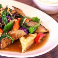 Spicy Eggplant · Stir-fried oriental eggplant and fried tofu with sweet bell peppers in a spicy black bean-ba...