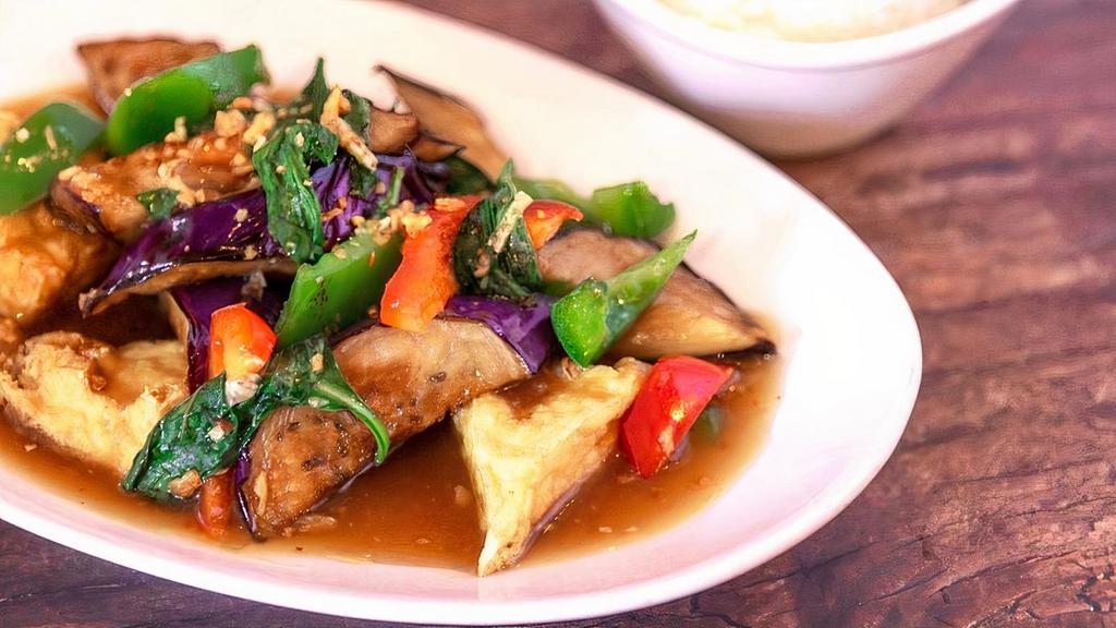 Spicy Eggplant · Stir-fried oriental eggplant and fried tofu with sweet bell peppers in a spicy black bean-basil sauce.