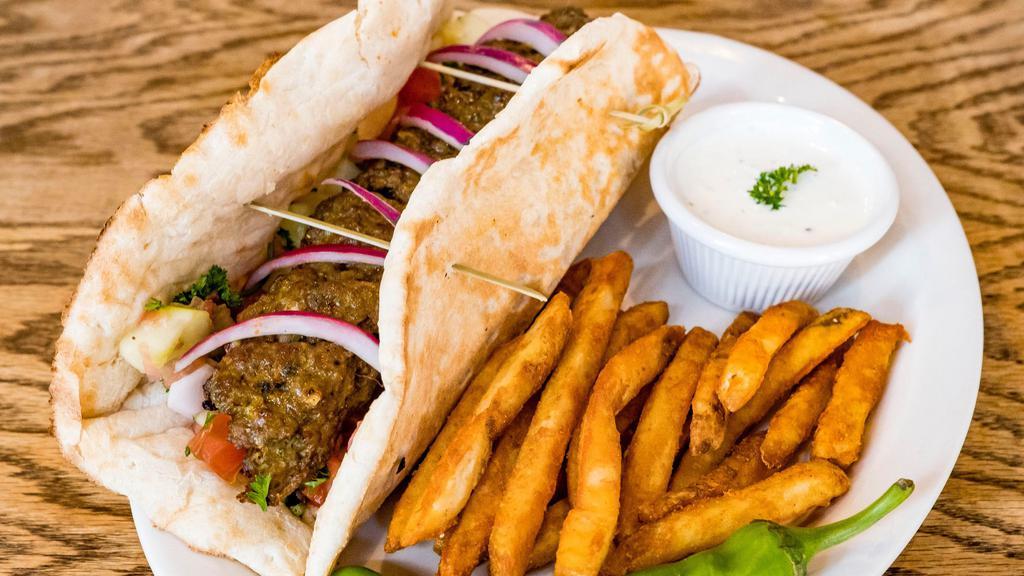 Beef Wrap \Soda\( Angus Steak) · Marinated steak, served with chopped salad and wrapped in fresh house baked naan. Served with French fries and soda.