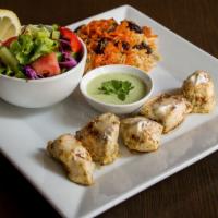 Malai Chicken · Tender pieces of chicken marinated in our sour cream butter sauce, with ginger, garlic and f...