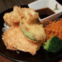 Scallop Tempura · Battered and lightly fried scallops and vegetables.