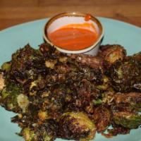 Fried Brussels Sprouts · Black pepper, Parmesan, and Chili Aioli.