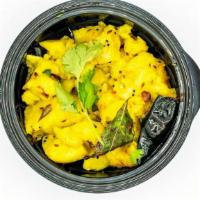 Potato Masala · South Indian Delicacy made with yellow potatoes, sautéed onions, and a tasty blend of spices...