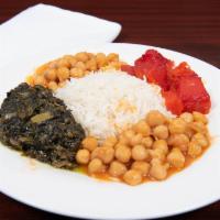 Vegetarian Rice Dish · Combination of kadu (sauteed pumpkin), subzi (fried spinach) and  bouranee baunjan (fried eg...