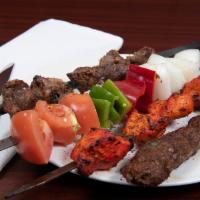 Super Dish · Chalau (white rice) served with meat sauce (qurma) and one skewer of each of Shami, Chicken ...