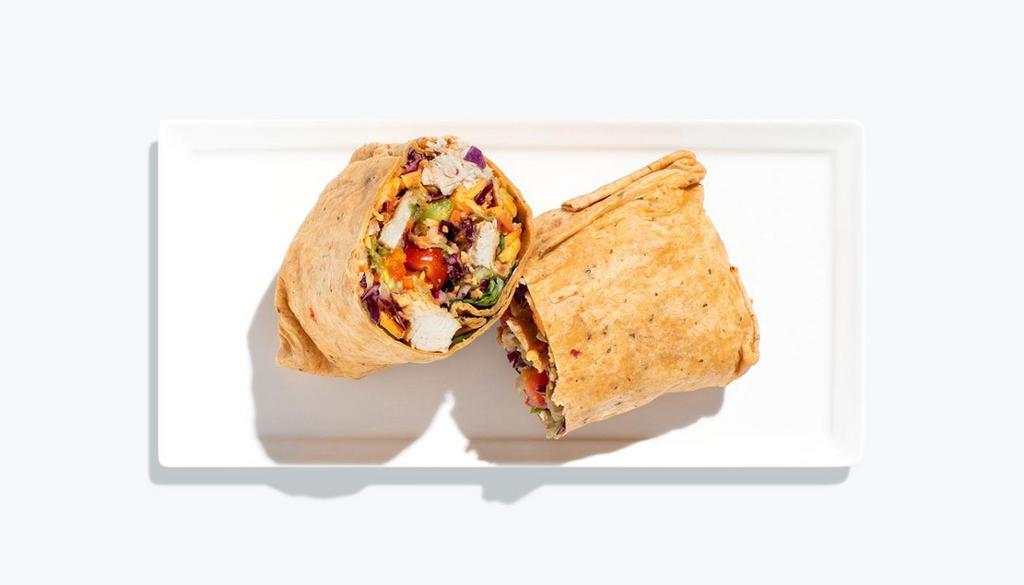Forbidden Fruit Wrap · Baby spinach, kale power blend, garlic roasted chicken, bacon, strawberries, dried cranberries, green apple, feta cheese, topped with toasted walnuts, and served with Blueberry Vinaigrette.
