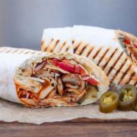 Chicken Shawarma Pita Wrap · Thinly sliced, marinated and spit-roasted chicken, served in a soft pita with charred carrot...