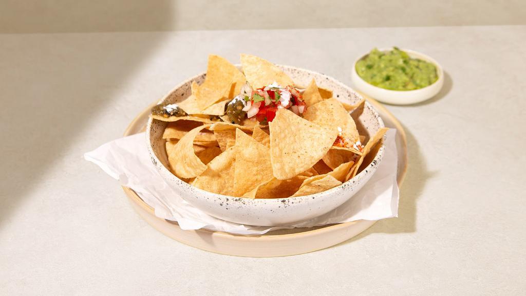 Chips And Guacamole · Tortilla chips with housemade guacamole.