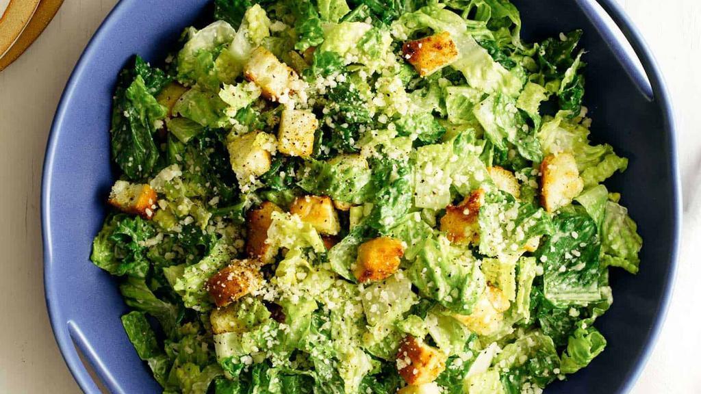 Caesar Salad · Romaine, Parmesan, house croutons and Caesar dressing.