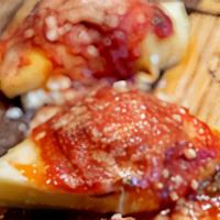 Ricotta Stuffed Shells 1 Piece · Stuffed with ricotta, provolone, and picorino romano cheeses, smothered in house made marina...