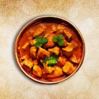 Chicken Tikka Feast · Char-grilled chicken morsels slow-cooked in a rich onion and tomato gravy with generous amou...
