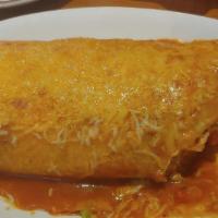 Wet Burrito · A flour tortilla filled with your choice of meat, rice, rancho beans, guacamole, and sour cr...