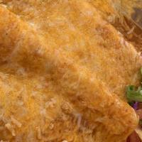 Enchiladas · Three enchiladas filled with your choice of chicken, cheese or ground beef. Topped with melt...