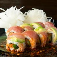 What The Hell Roll · Spicy tuna roll topped with albacore, avocado, ponzu sauce and chili oil