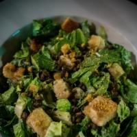 Caesar Salad Or Vegan Caesar Salad · Romaine tossed with Caesar dressing, Parmesan cheese, and garlic croutons. Add grilled chick...