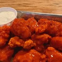 Boneless Wings · Eight boneless wings tossed in your choice of barbeque sauce, buffalo sauce, or spicy chili ...