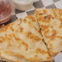 Cheese Quesadilla · Melted cheese inside a grilled flour tortilla. Served with sour cream and salsa.