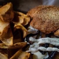 Mushroom Smoked Gouda Burger · Beyond Burger patty, sautéed Portobello mushrooms, Vegan Caesar dressing, and Vegan Smoked G...