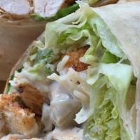 Grilled Chicken Caesar Wrap · Seasoned grilled chicken breast, chopped romaine, Parmesan, Caesar dressing and bakes crouto...