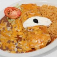 Burrito Ranchero · A bean and cheese burrito topped with ranchero sauce, melted cheese and sour cream. Served w...