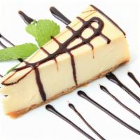 Cheesecake · New York style Cheesecake served plain or with chocolate sauce topping for an additional fee.