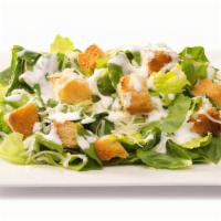 Caesar Salad · Romaine Hearts with Croutons, Parmesan Cheese, and Caesar Dressing.
