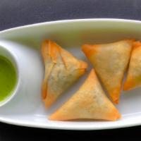 Sambusa · Hand-wrapped shells on thin pastry filled with your choice of lentils, beef, or chicken.