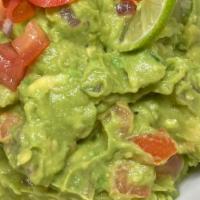 Guacamole Norteno · Avocado with  tomato, onion and jalapeno peppers comes with corn tortilla chips.