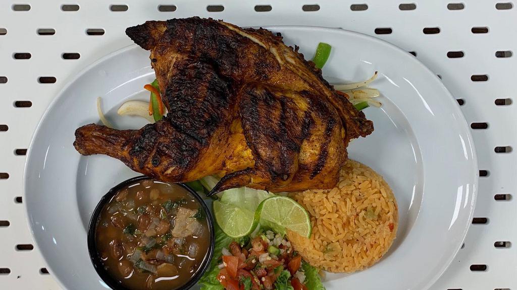 1/2 Pollo Asado (Half Grilled Chicken) · Grilled chicken served with Mexican rice,pico de gallo , charro beans and corn or flour tortillas.