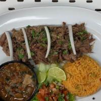 Barbacoa Plate · 1/2 Pound of slow cooked beef served with Mexican rice , pico de gallo your choice of refrie...