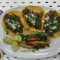 Barbacoa Taco Plate · 3 barbacoa tacos slow cook beef 
Charro beans, onions and cilantro Fresh and special sauce t...