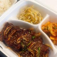 La Galbi (La 갈비) · Korean style grilled beef short ribs with marinated house sauces.  Served with a bowl of ric...