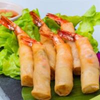 Spring Rolls · Vegan. Crispy spring rolls filled with bean thread, cabbage, carrots, celery served with plu...