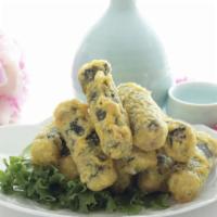 Fried Seaweed Rolls · Lightly dusted seaweed roll deep fried, stuffed with shrimp, pork, chicken and water chestnu...
