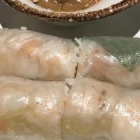 Green Papaya Roll (2)  · Shrimp, Marinated Green Papaya, Vermicelli and Lettuce Rolled in Rice Paper. Served with Pea...