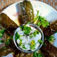 Grape Leaves · Most Popular. Seasoned rice wrapped in grape leaves; 6 pieces.