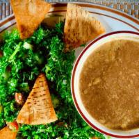 Soup & Salad · Choice of Tabouli or Mediterranean salad served with a bowl of soup and pocket pita bread.