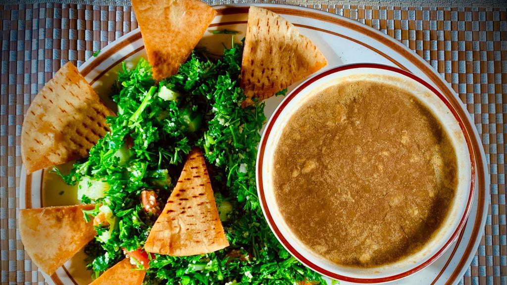 Soup & Salad · Choice of Tabouli or Mediterranean salad served with a bowl of soup and pocket pita bread.