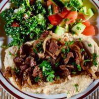 #9 Hummus Bel-Laham · Hummus topped with choice of specially seasoned grilled meat. Includes hummus, optional Hous...